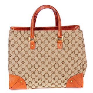 GUCCI - a Nailhead Tote. Designed with an open top, featuring maker's signature GG canvas exterior w