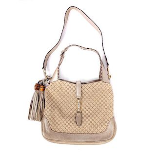 GUCCI - a New Jackie Hobo Bag. Designed with a beige diamond canvas exterior, grained leather trim,