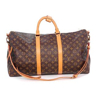 LOUIS VUITTON - a Keepall Bandouliere 50 Luggage Bag. Featuring maker's classic monogram coated canv