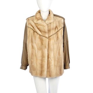 A tourmaline mink and leather jacket. Designed with a mandarin collar, hook and eye fastenings, beig