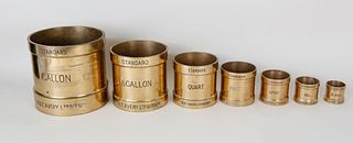 Set of 7 World War II English Royal Navy Bronze Standard Liquid Measures