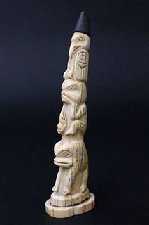 Carved and Stippled Northwest Walrus Ivory Totem, 19th Century