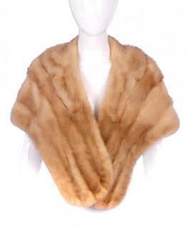 A dawn pastel mink stole. Designed with a notched lapel collar, two very small exterior pockets and