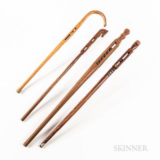 Four "Trapped Ball" Canes or Walking Sticks