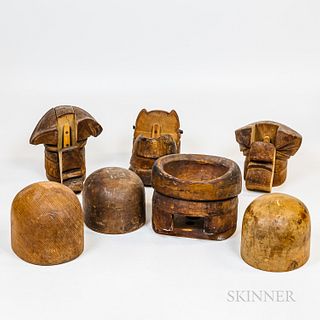 Seven Wooden Hat Molds