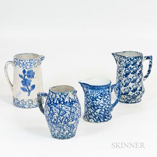 Four Blue Sponge-glazed Stoneware Pitchers