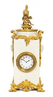A French Gilt Bronze Mounted Blanc de Chine Mantel Clock Height 17 1/2 inches.