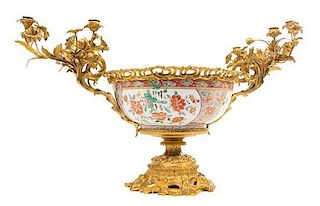 A French Gilt Bronze Mounted Japanese Porcelain Centerpiece Bowl Height 21 x width over candelabra 36 inches.