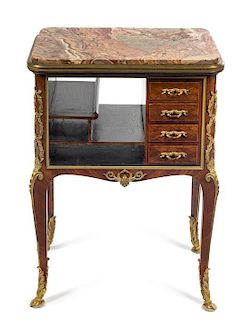 A Louis XV Style Gilt Bronze Mounted Kingwood and Parquetry Stationery Table Height 31 x width 23 x depth 15 1/2 inches.