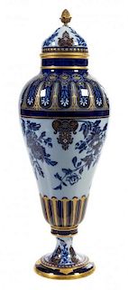 A Large Sevres Style Porcelain Urn and Cover Height 46 1/2 inches.