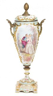 A Sevres Style Porcelain Urn Height 25 1/2 inches.
