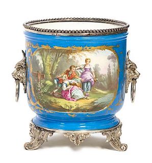 A Silvered Bronze Mounted Sevres Style Porcelain Jardiniere Height 12 x diameter 10 1/2 inches.
