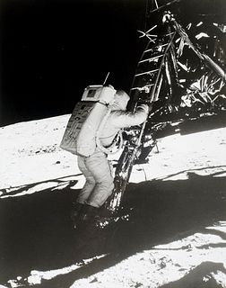   Apollo 11 Onboard film-astronaut Edwin E. Aldrin Jr., lunar module pilot, descends steps of Lunar module ladder as he prepares to walk on the moon. 
