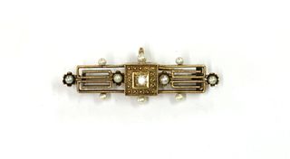 A gold Archaeological revival diamond and seed pearl brooch,