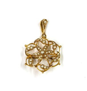 A gold split pearl pendant/brooch,