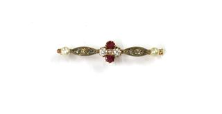 A gold and silver, ruby, diamond split pearl bar brooch,