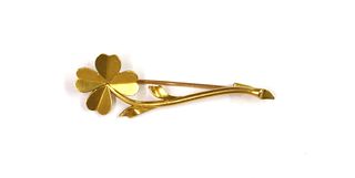A French gold flower brooch,