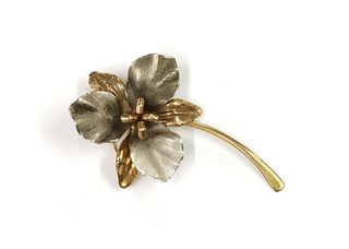 A 9ct yellow and white gold flower brooch, by Ecco,