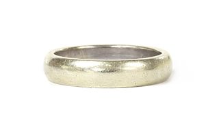 A 9ct white gold 'D' section wedding ring,