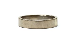 A white gold flat section wedding ring,