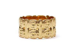A gold two row pierced band ring,