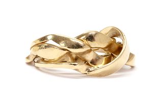 A gold four row puzzle ring,