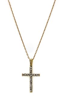 A 9ct gold cubic zirconia set cross pendant,