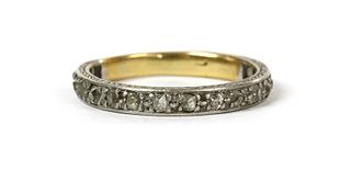 A platinum and gold diamond eternity ring,