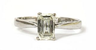 An 18ct white gold single stone emerald cut diamond ring,