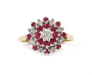 A 9ct gold diamond and ruby target cluster ring,