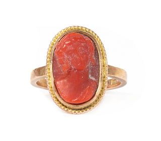 A gold coral cameo ring,