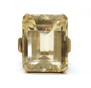 A gold single stone citrine ring,