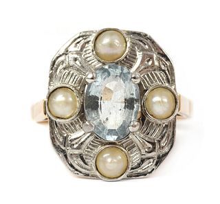 A gold aquamarine and split pearl ring,