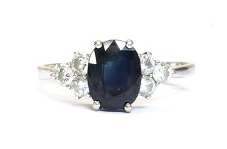 A white gold sapphire and diamond ring,