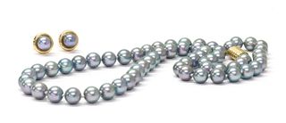 A single row uniform dyed cultured pearl necklace,