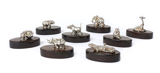 A set of eight silver animal place card holders, by Patrick Mavros,