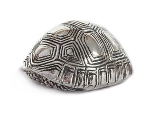 A silver sculpture of a tortoise, by Patrick Mavros,