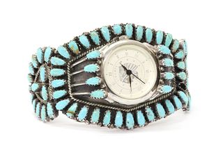 A Navajo Southwest Indian turquoise set bangle watch, by Larry Moses Begay,