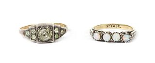 A silver and gold paste set ring,