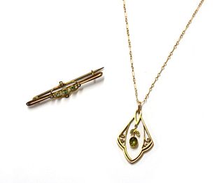 An Edwardian gold peridot and split pearl pendant,
