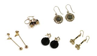 Five pairs of gold and silver earrings,
