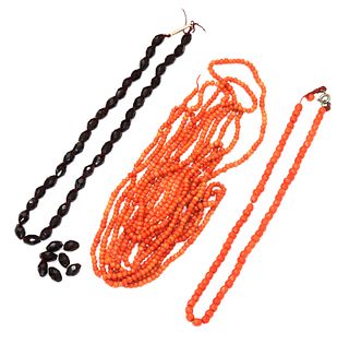 A long string of coral beads,