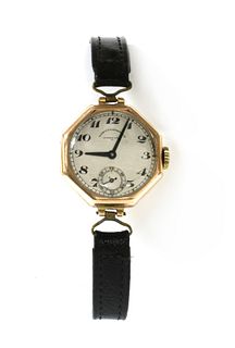 A ladies' 9ct gold Goldsmiths and Silversmiths Co. Ltd. mechanical strap watch,