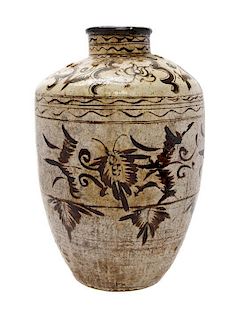 A Chinese Glazed Terra Cotta Jar, PROBABLY 16TH/17TH CENTURY, Height 26 1/4 inches.