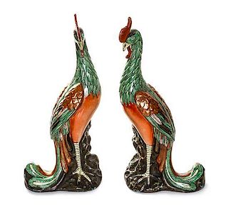 * A Pair of Chinese Export Polychrome Enameled Figures of Phoenix, Height 17 1/2 inches.