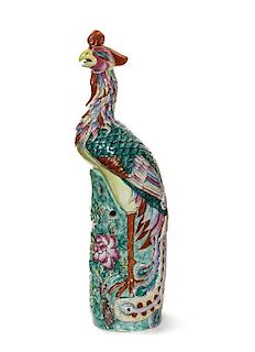 * A Chinese Export Polychrome Enameled Porcelain Figure of a Phoenix, Height 18 1/2 inches.