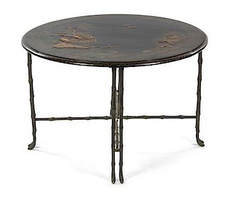 A Chinese Export Black and Gilt Lacquered Table, Height 21 1/2 x diameter 33 inches.