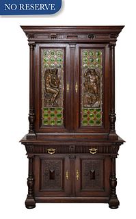 FRENCH RENAISSANCE-REVIVAL STAINED-OAK COLORED LEAD-GLASS AND BRONZE-INSET STEPBACK BOOKCASE CABINET, LATE 18TH CENTURY