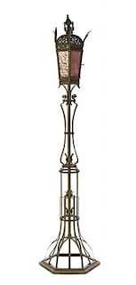 A Gothic Revival Iron Torchiere, Height 88 inches.