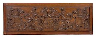 A Carved Oak Panel, Height 26 x width 72 inches.